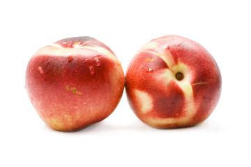 Fototapeta na wymiar Two red Peaches isoaled on white background