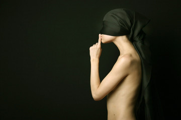 Naklejka premium Nude woman with black bandage