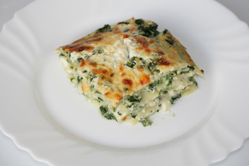 Vegetarian lasagne with ricotta cheese and spinach filling