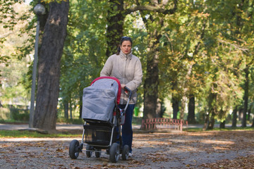 Obraz premium Mother with pram