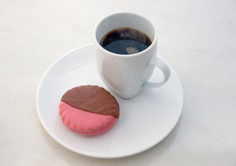 decorative biscuit and black coffee