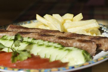 kebab with salad