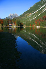 Cave del Predil lake in fall, vertical