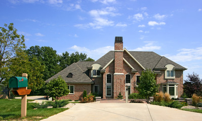 Luxurious executive home with blue sky