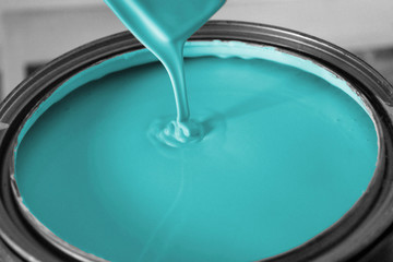 bucket of turquoise paint