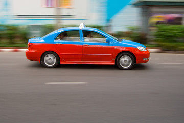 Fast taxi in city traffic