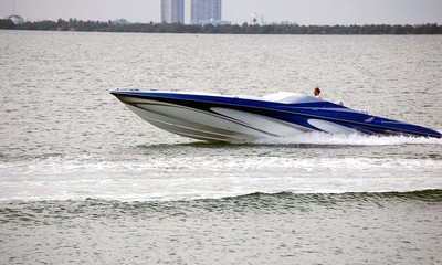 Fototapeta premium Blue and White Power Boat
