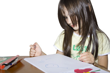 girl draws in a sketch-book