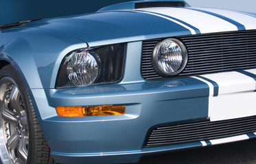 Obraz na płótnie Canvas Metaliczny niebieski nowoczesny amerykański muscle car