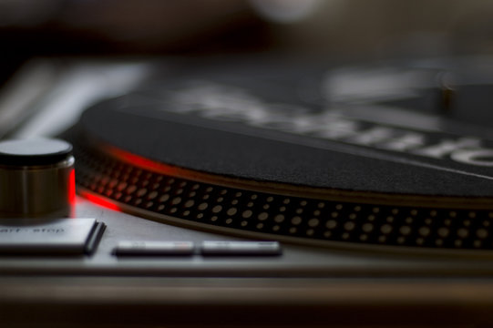 turntable dj close up record equipment red light