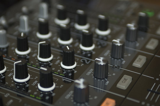 black buttons on dj mixing equipment tool