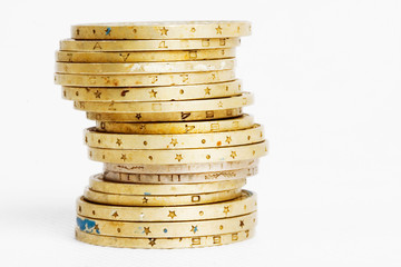 Golden coins isolated on white