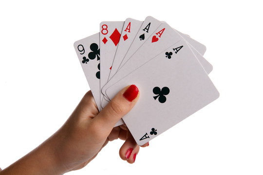Mains avec des cartes de jeux