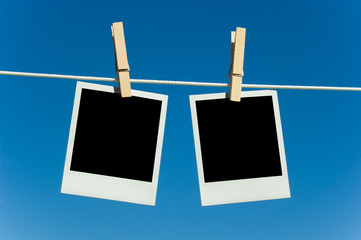 Photographs on a clotheline