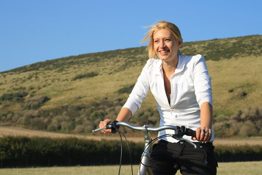 Healthy teenager on a bike ride smiling