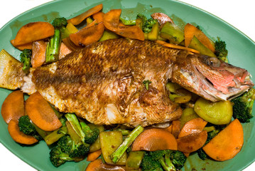 Fried pargo (mutton snapjack) with vegetables