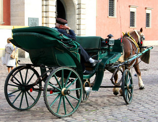 Carriage with a sleeping coachman in Warsaw Old Town