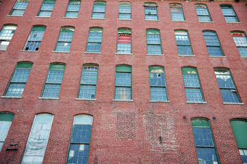 Rows of Windows in Brick Wall of Old Factory © pmstephens