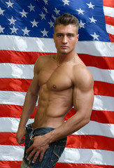 Muscular Sexy Man with US Flag behind