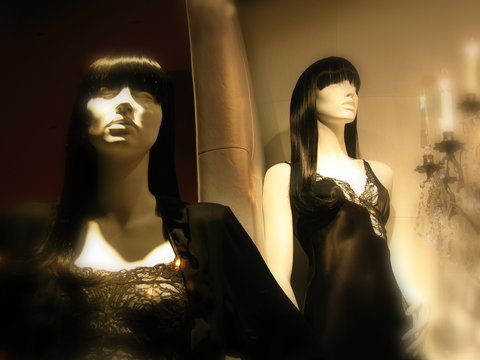 Mannequins in sleepwear displayed in upscale boutique