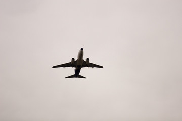 Fototapeta na wymiar Flying passenger jet air plane
