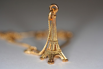 small gold souvenir of eiffel tower