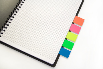 notebook with colour sticks