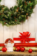 Holiday wreath with snow globe
