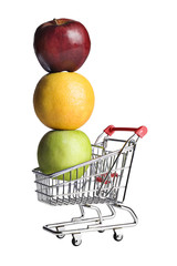 Apples and an orange in a miniature shopping cart
