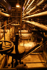  Equipment, cables and piping as found inside of a modern indust