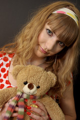 	Girl with bear toy