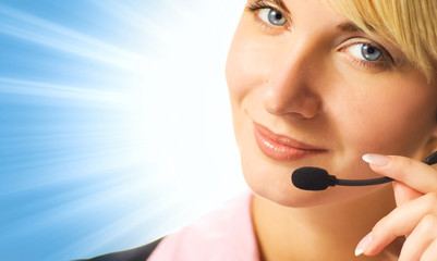Friendly phone operator on blue abstract background