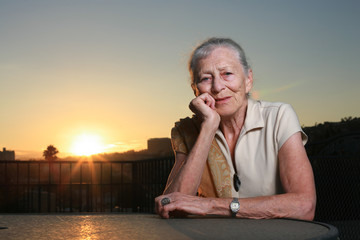 Portrait of a senior lady at sunset
