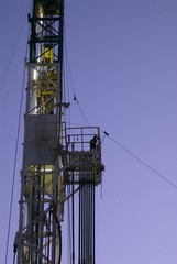 Roughneck on drilling rig pipe rack
