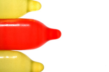three color condoms separated, kondome