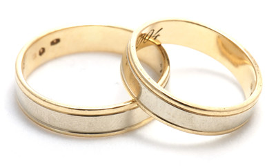 Wedding rings on white background