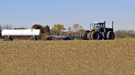 Naklejka premium Tractor and Plow