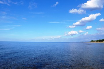 Fototapeta premium Still blue water sea