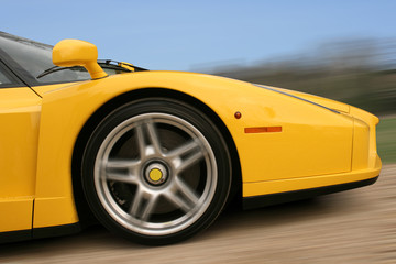 Bright yellow Italian super car