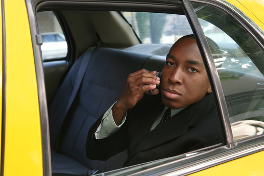 Business Man in Taxi