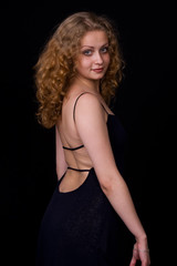 Fototapeta premium The girl in a black dress