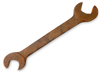 Large rusty spanner wrench isolated on white.