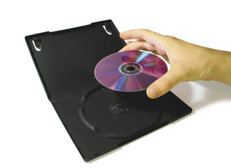 Fototapeta premium Hand put DVD in case - 3
