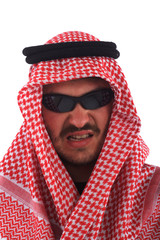Man wearing keffiyeh and sunglasses against white background