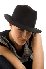 young woman in black hat