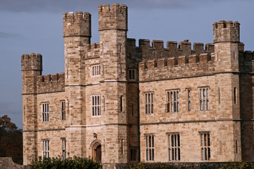 front entrance to castle with tall towers