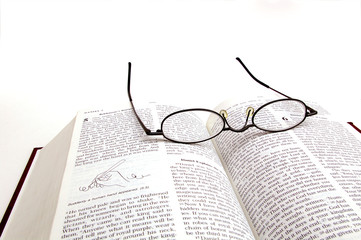 Glasses on Bible