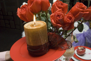 Obraz premium Candle and roses