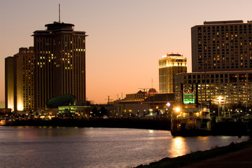 Hotels and casinos on Mississippi river at sunset