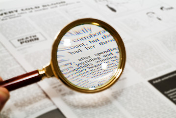 Magnifying glass highlighting the word